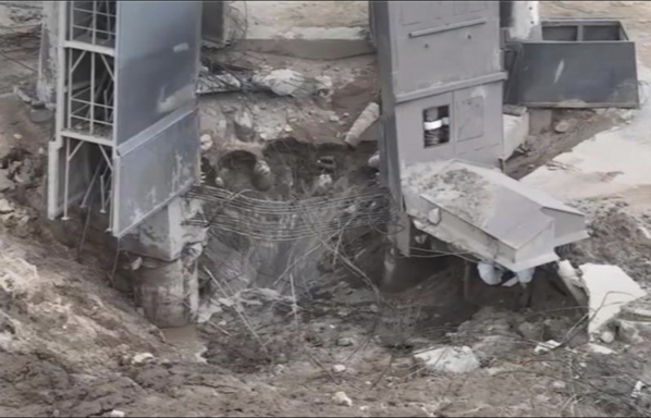 A photo with significant damage of the SpaceX launchpad. Like, significant.