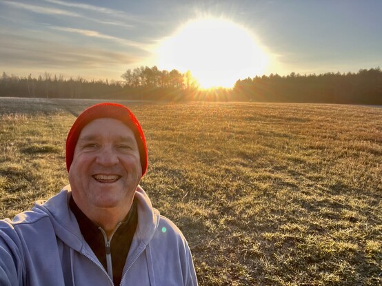 Another photo of a future is Jim Carroll with a sunrise behind him